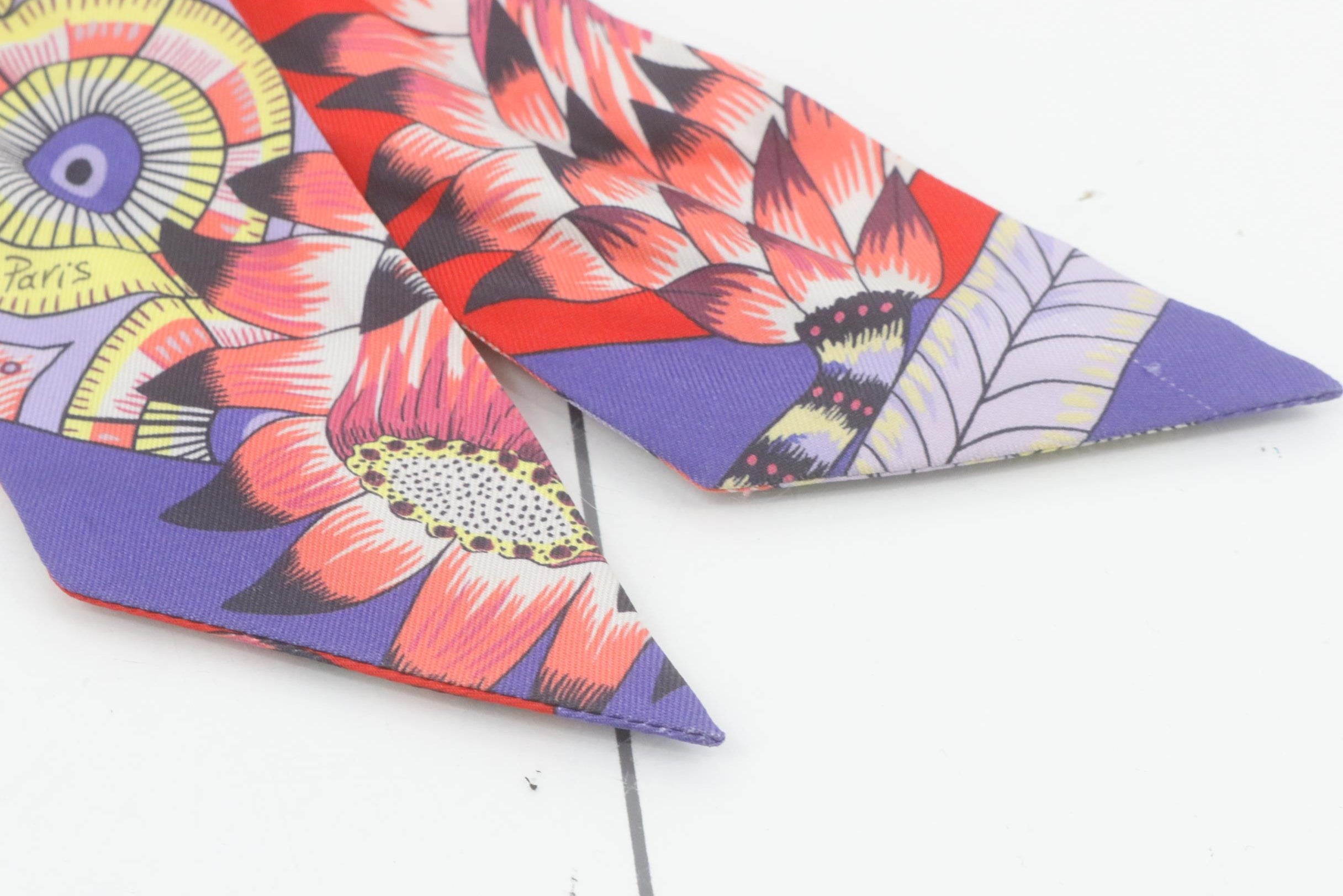 Colorful geometric patterned fabric on a white background