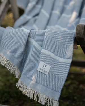 Serviette de plage rayée – Rifò (Bleu ciel/Crème)